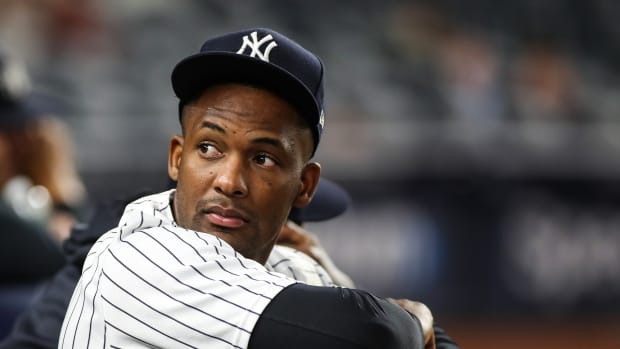 Yankees 3B Miguel Andujar sits in dugout
